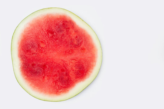 Round Slice of Watermelon on a White Background