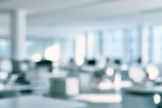 Soft-focus office interior with airy white space for background graphics