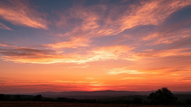 Tranquil Evening Sky Backdrop with Soft Clouds and Golden Light