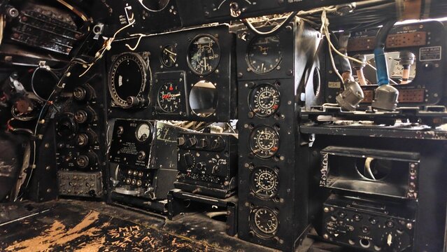 Analog Flight Instruments and Dials in a Historic Bomber Cockpit