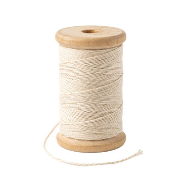 Natural twine on a wooden spool, isolated on a transparent background