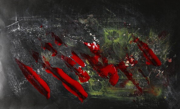 Paint stained and scratched black paper background, colorful scrabble, design element