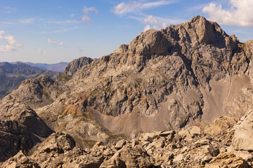 Naklejka premium View of the peaks of the Picos de Europa mountains in the national parks of Spain. Summer in the mountains of Europe