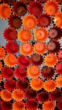 Detail of a lamp made with colored candles