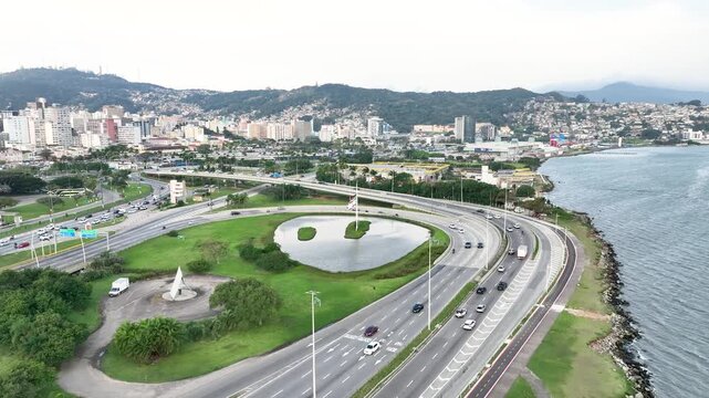Florian&oacute;polis, Pedro Ivo Campos and Colombo Salles bridges. Aerial drone view of urban traffic and cityscape. Establishing shot.
