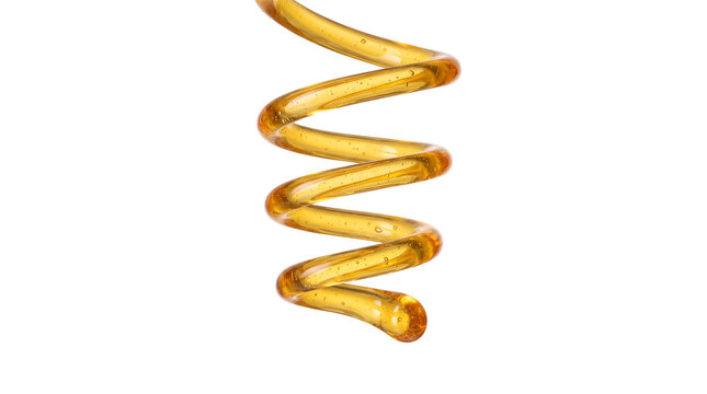 Golden honey stream drizzling in fluid spiral motion for organic food liquid packaging banner concept on transparent background