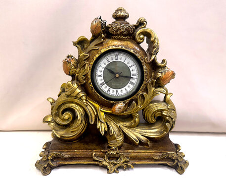 Antique clock in an artistically crafted case