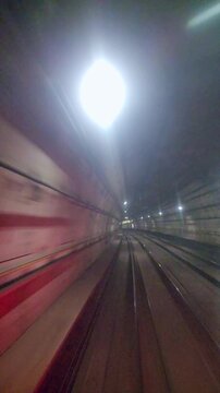 View From Inside Subway Train Moving Through Underground Tunnel