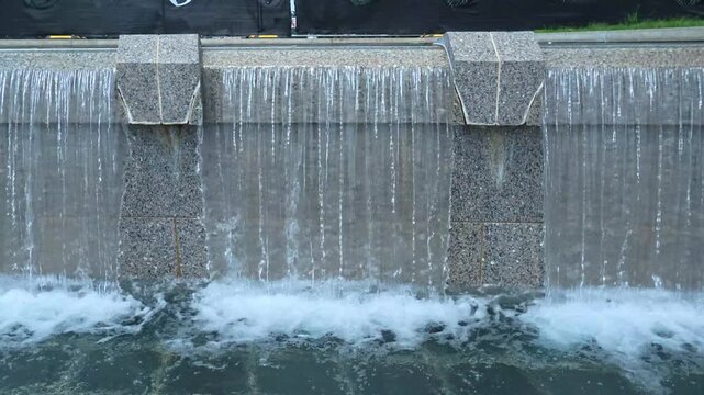 Travel and Landmarks: Close Up View of Water Jets in Rainbow Pool Fountain at National World War II Memorial in Washington DC