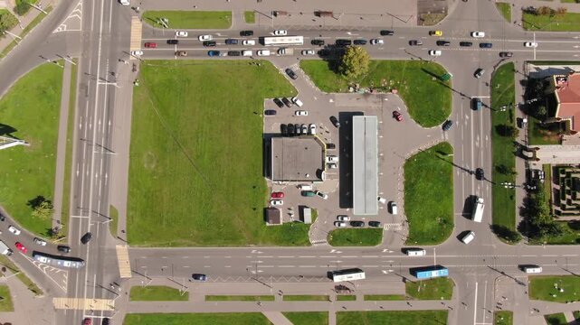 Drone rises vertically above gas station