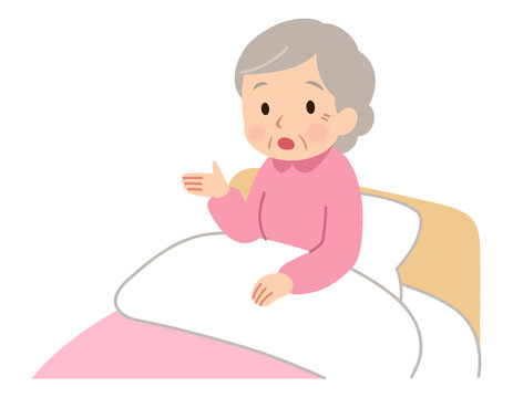 ベッドに座る高齢女性　話す　質問　表情