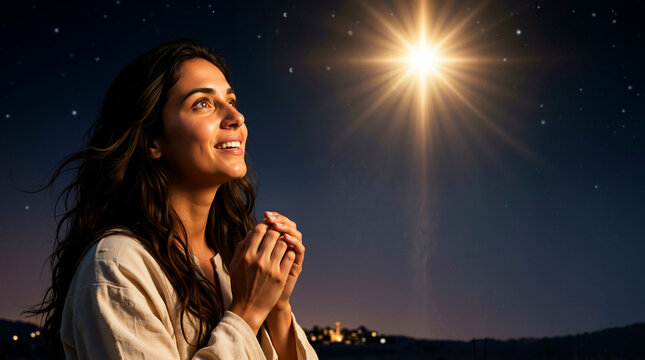 Woman looking up at the Star of Bethlehem in prayer. Happy young female in biblical robe smiling under a bright shining star at night. Faith and Christmas nativity concept