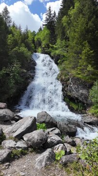 Waterfall landscape. Nature wildness. Rapid waterfall travel destination. Picturesque waterfall. Travel destination. Cascading water. Scenery waterfall route. Nature mountain landscape