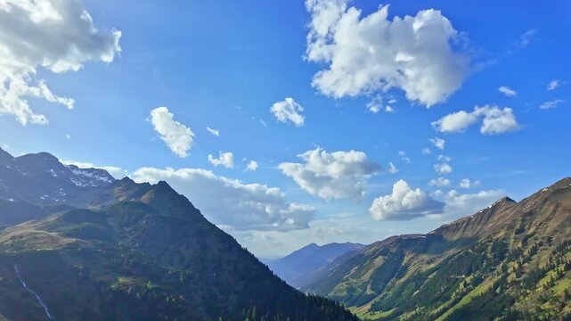 Scenic hill alpine scenery. Panorama mountain landscape. Nature scenery and mountain landscape. Travel and outdoor exploration. Amazing summer day in wild mountain with coniferous forest