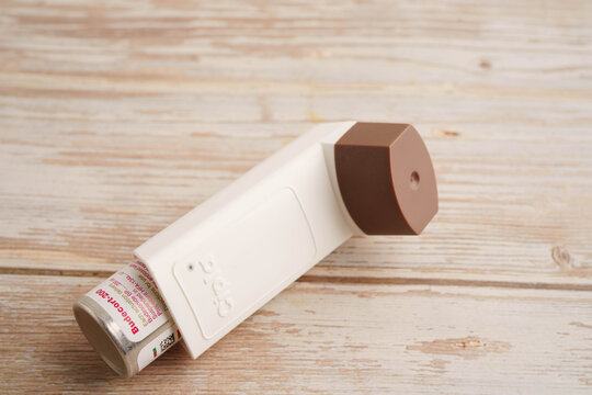 Bangkok, Thailand May 4, 2026 Asthma and chronic obstructive pulmonary disease COPD, Asian teenage using metered dose inhaler MDI.