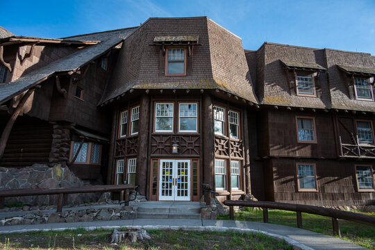Historic landmark building architecture, Old Faithfull Inn, rustic wood beam construction, summer vacation in Yellowstone National Park
