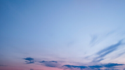 The sky at sunset is cloudy. Beautiful photo of heaven in high quality. Stock image of clouds. © Artskrin