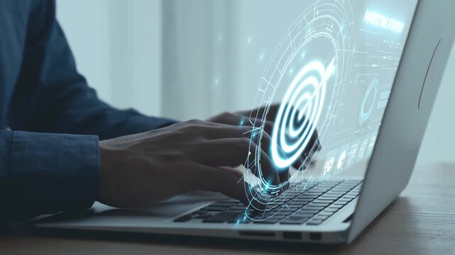 Hands typing on a laptop with digital technology interface, futuristic holographic display and overlay graphics for data interaction and innovation concepts. Qubit.