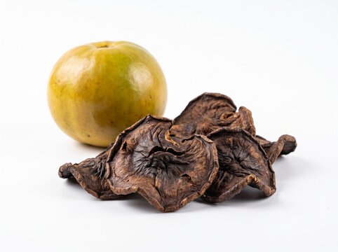 Fresh and dried monk fruit luo han guo isolated on white background, a natural sugar substitute sweetener and traditional Chinese medicine herb