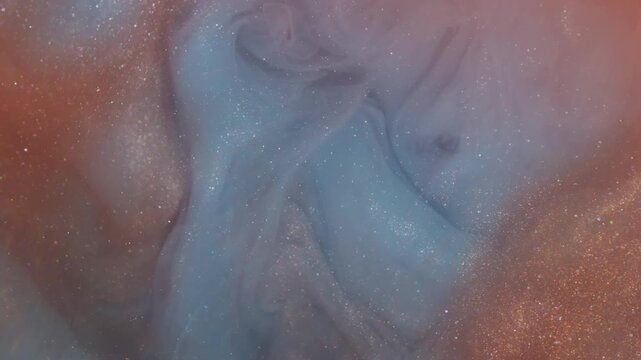 Shimmer paint wave. Mist art. Blur orange blue color cloud glitter fume acrylic rainbow bright texture spreading on abstract creative background.