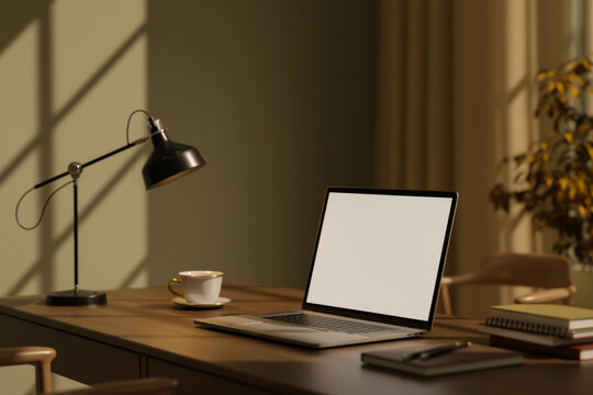 Laptop Mockup with Blank Screen on Wooden Desk in Warm Sunlight Workspace