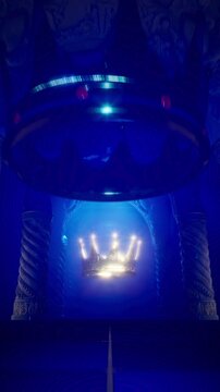 Seamless Infinite Camera Loop Passing Through Ornate Blue Pillars Shrine with Levitating Crown