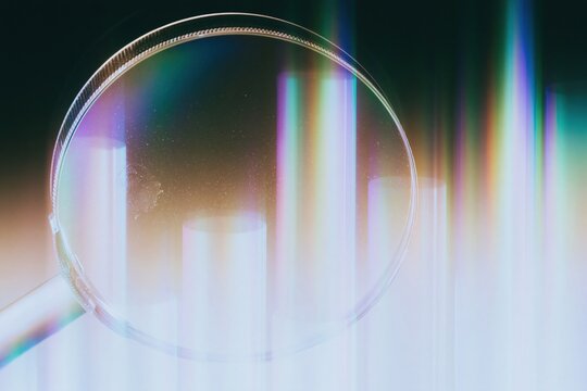 Magnifying glass hovering over rising chart bars with a polished silver finish and soft lilac haze, for data analytics and market research