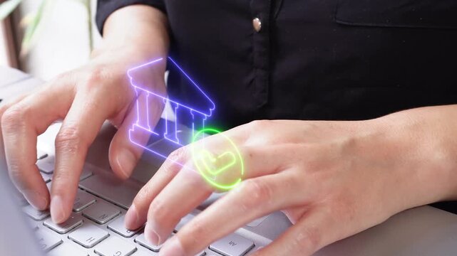 Verified banking services. A close-up view of a female executive using her laptop in the office, featuring a virtual bank icon with a checkmark.