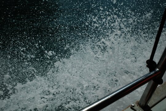 White spray from boat hull