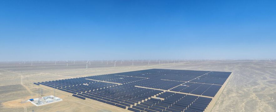 Vast Solar Photovoltaic Power Station and Wind Turbine Array on Endless Gobi Desert