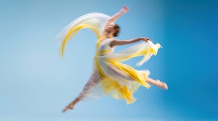 Obraz premium Graceful young ballerina in a flowing yellow dress jumping and dancing through the air against a bright blue background
