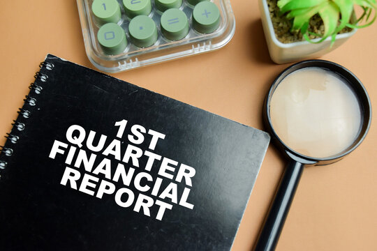 Concept of 1st quarter financial report write on book isolated on table.