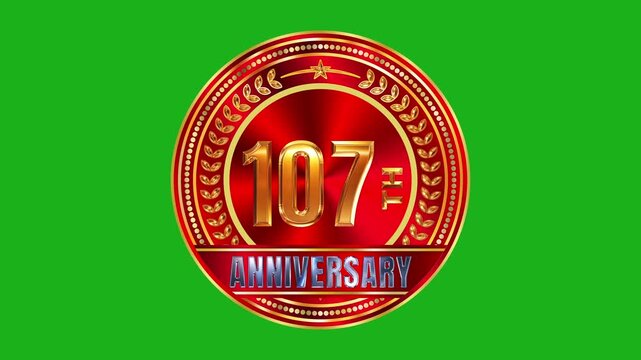 Luxury 107th anniversary golden badge with radial ruby red gemstone texture and cinematic studio lighting on green screen 4k video