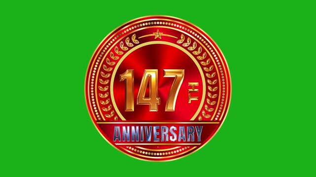 Shiny 147th anniversary metallic golden emblem with polished red garnet stone disc and rim lighting on green screen 4k video