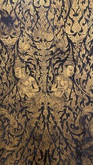 Traditional Thai Buddhist mural painting depicting Buddhist mythology on the temple wall in Bangkok, Thailand. © lawplow