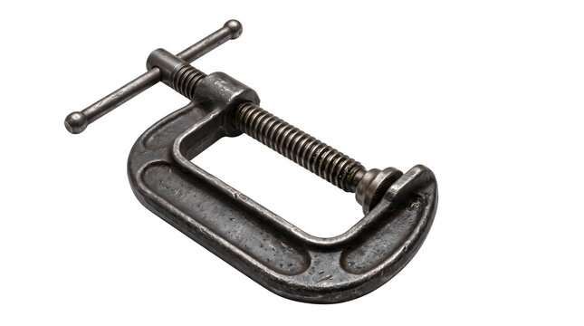 Vintage metal C-clamp on white background. Industrial steel G-clamp tool for woodworking. Antique iron screw clamp for workshop repairs.