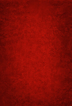 Dimly lit crimson concreted masonry at night