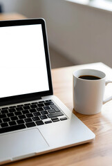 Fototapeta premium Remote work and digital lifestyle, laptop with blank screen and coffee mug on a wooden desk, copy space for text