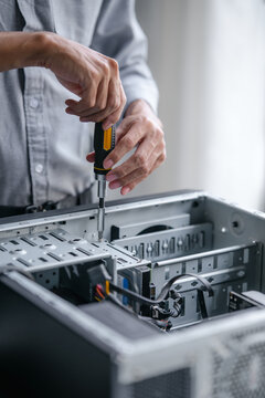 Computer repair technician specialist repairing and testing on Pc
