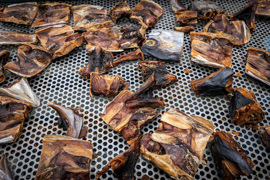 Sun-dried Spanish mackerel. Preserved seafood product.