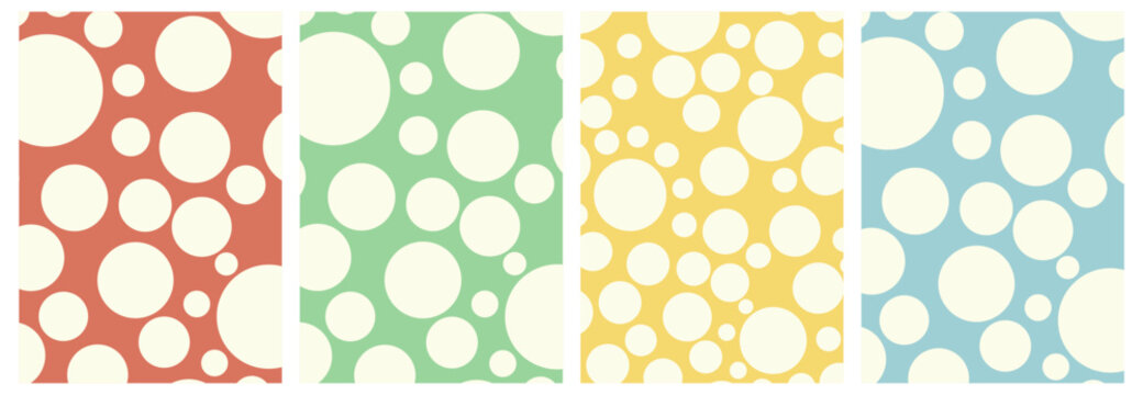 A set of four vertical posters, each with a seamless pattern of randomly scattered cream-colored polka dots against a solid background. The background colors are, from left to right: terracotta, mint 