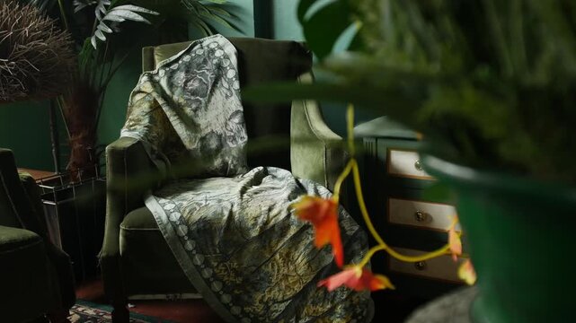 Moody Green Vintage Living Room Interior with Velvet Armchairs and Tropical Leaves