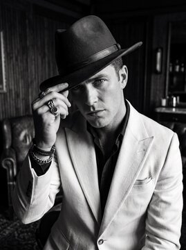 Stylish Man in Suit and Fedora Hat