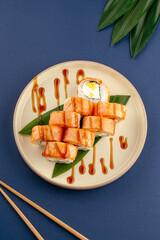 Seared salmon sushi rolls drizzled with teriyaki sauce © Cavan