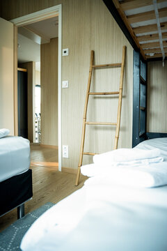 Cozy modern bedroom with bamboo ladder and bunk bed