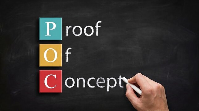 Hand Writing Proof Of Concept Next To POC Acronym Blocks On Chalkboard