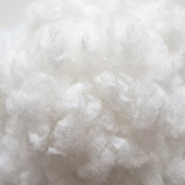 Closeup of soft white polyester fiber filling material for pillows and cushions