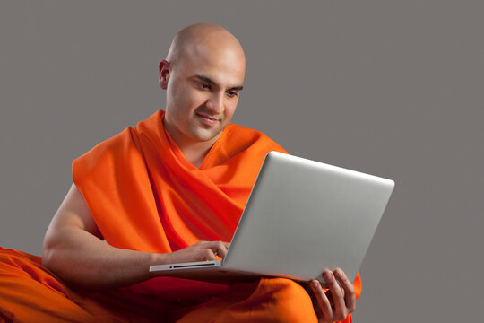 Monk with a laptop 