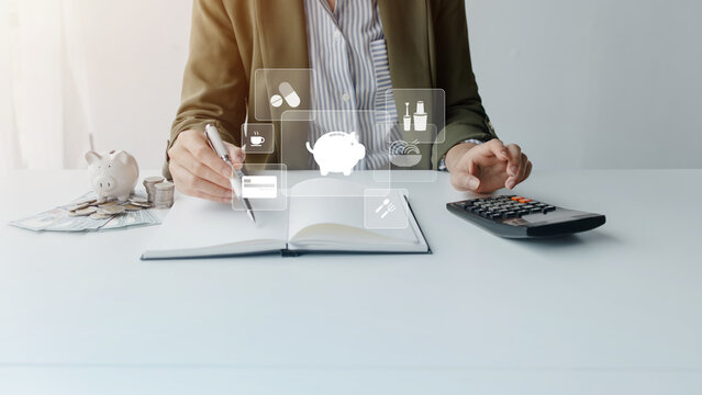 Business professional managing digital finance with virtual financial icons, representing financial planning, investment management, digital banking, budgeting, and smart business decisions.