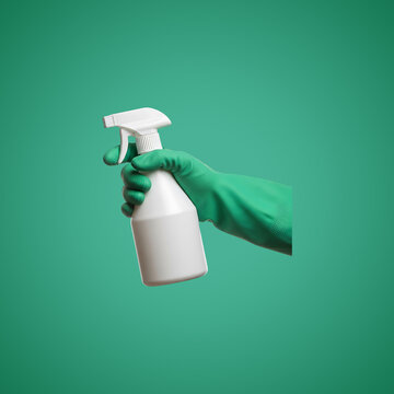 White spray bottle with green trigger and cap on teal background